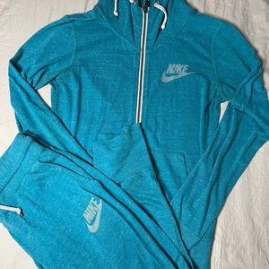 nike teal track suit